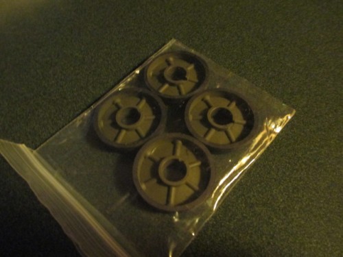 Two sets of turned down HL Idlers sans caps.  Those you have to provide for yourself.