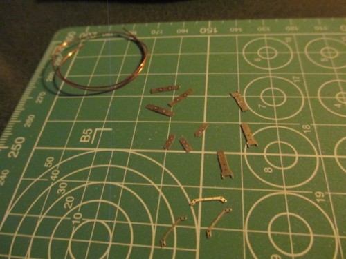 A start on the clamps needed to attach the jack and starter crank to the back plate