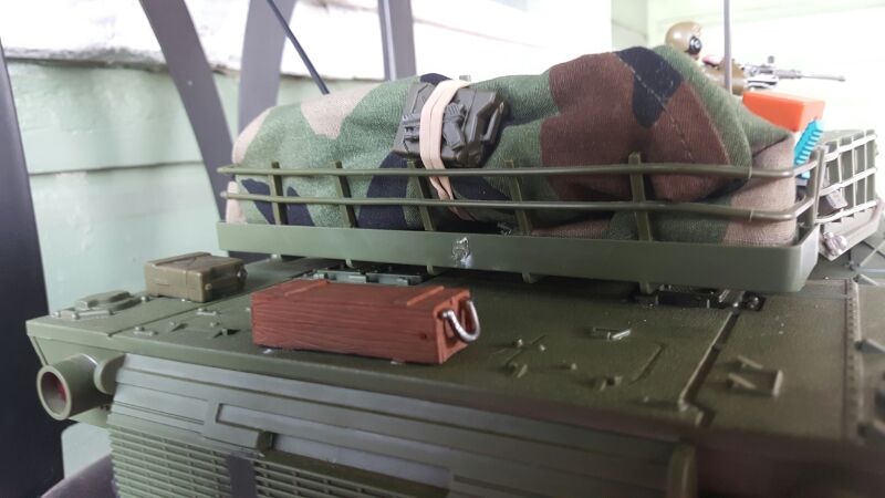 The rolled up &quot;tarp&quot; thing on the back of the turret is just a M1 helmet cover i rolled up and tied with a rubber band to keep it together.