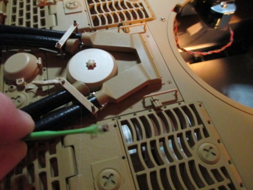 Using a Stix(tm) to screw on the tiny nuts for the air hose bracket