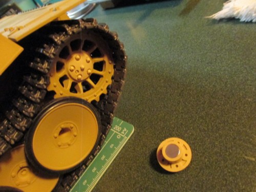 Magnets I had were a press fit (tapped in with a small hammer).  Those hubs are not going anywhere.