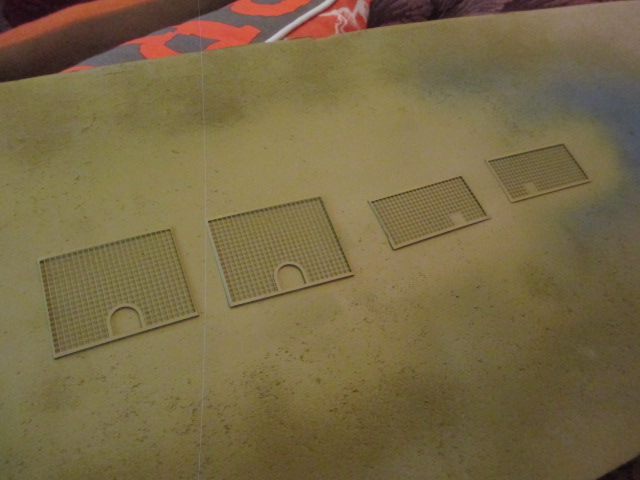Edges bent to follow the heavy engine grills then a couple of coats of Model Masters Desert Yellow