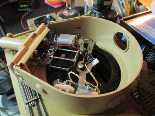 Step 36 complete with gearbox screwed into place and wires set aside.