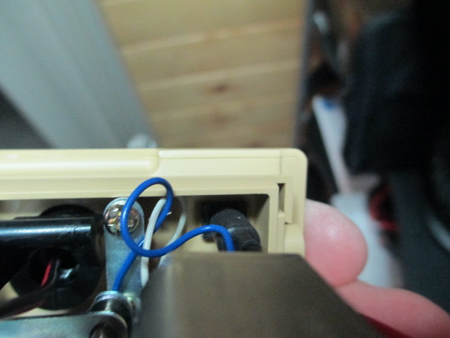 I wanted something a little beefier and used the excellent Taigen aluminum MG  This entailed using 24 hour epoxy to mount a plastic washer I cut out so that the MG is secure.