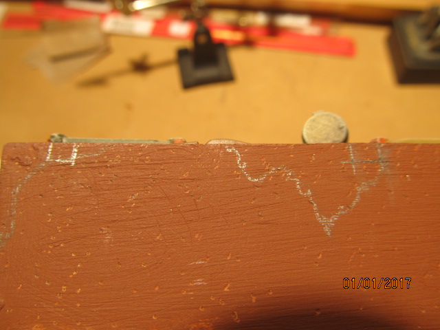 Figuring out where to place tie down points for engine tarp cover on side hull.