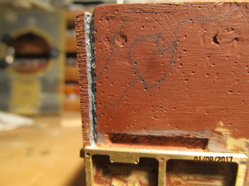 Aft port side vertical weld seam scarfed out.