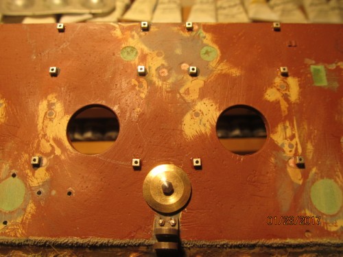 IMG_4296.JPG (126.11 KiB) Viewed 3661 times Heat shield mounts in place & brass starter cover cap