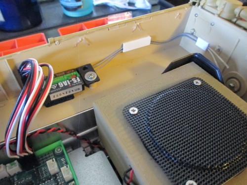 Receiver was a simple matter of a Velcro mount and using the antenna mount to hold the wires in place.  Little white rectangles are C extrusions glued in place to make a track