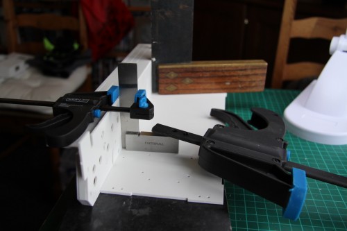 Bonding Track plate assembly to Hull floor