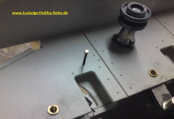 Suspension with metal arms and spring
