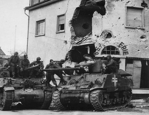 M36_Tank_Destroyer_Recaptures_M4A3_76_from_Germans_in_Aschaffenburg_1945.jpg