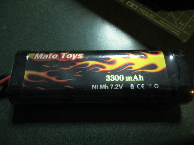 MATO supplied battery, a 3300.  Odd.  I hope the new 5000NmH will work better