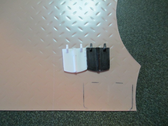 My version of a base for the extra 'kick out' piece of diamond plate under the fire extinguisher.