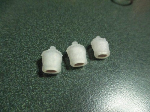 Shapeways WWII US canteens filled with milliput and set aside to cure.