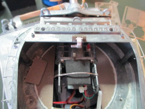 Another view showing the modified hinge and catch.