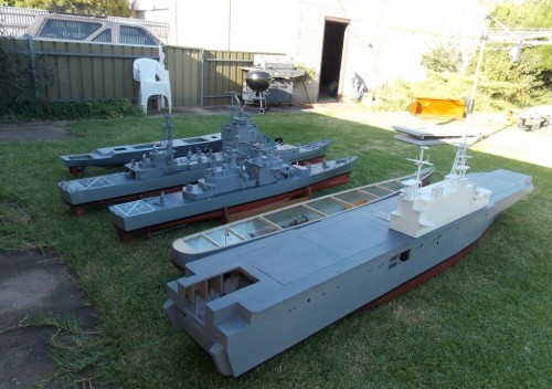 from front to back: USS Saipan LHA2, hull for USS Albany CG10, then USS California CGN36(currently the only one on active duty), USS Long Beach CGN9 (in refit), not quite visible is USS Shark SSN591 my Skipjack class sub (awaiting parts for busted airpump), and finally my Arleigh Burke class USS John Paul Jones DDG53 (underconstruction)