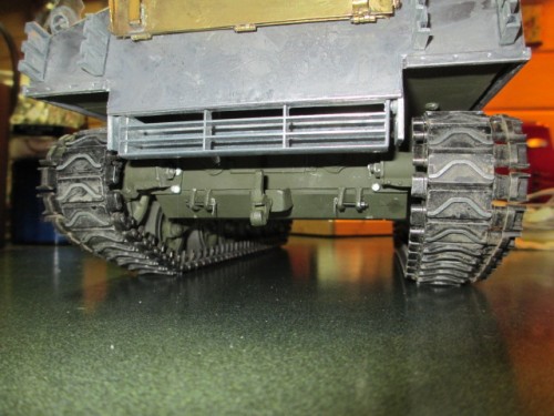 Screws and bolts cut short and filed smooth and screw heads filled to sand flat.