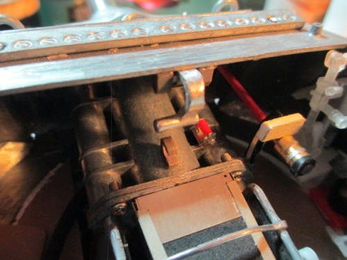 The gun breech travel lock was bothering me as my first attempt had it wrong side up.  There, it was blocking the mounting spot for the .50 cal Dismount Tripod so,  Fixed...