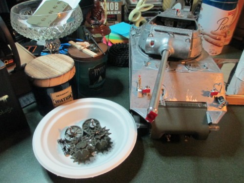 Tracks, sprockets and idlers removed.  A little more screw cap work done.
