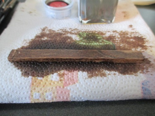 Soaked in woodstain and sanded then soaked again for that craptastic board look the Sherman tankers favored.