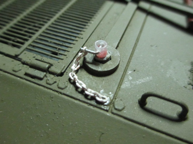 Minute work with a plastic tube and a paper clip and fiddly chain produced this...