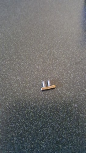 Continuing on with a piece of brass square and a couple of zinc cutoffs gives you...