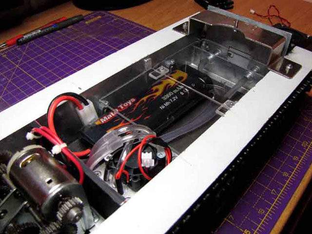 Because of the position of the tabs in relation to the bogie blocks the deck rests on it is tightly secure in place but will slide out easily when needed