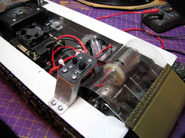 Finally I come to rewiring the electronics (or what I can for now) and the inclusion of a switch board for power and the smoker was needed. I placed this at the front so as to be accessible through the driver's mate's hatch. The tricky part was setting it so it gave sufficient clearance for the periscope box that drops below the hatch when closed