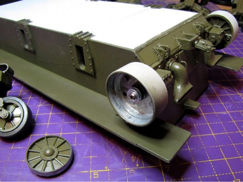 Next was the assembly of the lower hull, starting with the idlers. Here I came across my next little problem. I wrongly said earlier in the thread that none of the wheels have bearings - that was wrong as, in fact the idlers, and only the idlers, do have ball races fitted (whaho!) - but this wasn't the problem. The first idler I fitted with no issues but the second, the one in the picture with the outer shell/cap removed, had a big issue. That screw in the centre that holds the wheel on to the concentric adjuster stripped it's thread. Consequently I had to tap a new thread and fit an over-size screw to which I added a spring washer.