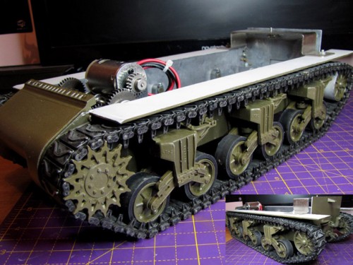 I eventually got the motors in , front sprockets and transmission cover fitted and tracks back on (the pin outer links of which, I would add, are quite prone to breaking) . The electronics including the TK24, smoker and speaker are needed but, otherwise the lower hull is now pretty much complete