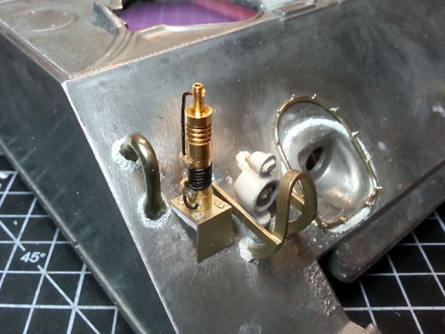 Here it is easier to see why the lifting eyes on the glacis plate are nearer the edge on some variants - it makes room for the antenna mount.