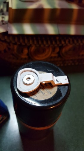 Painted in interior elfenbein and black with a rare earth magnet to help keep the Commander in place.