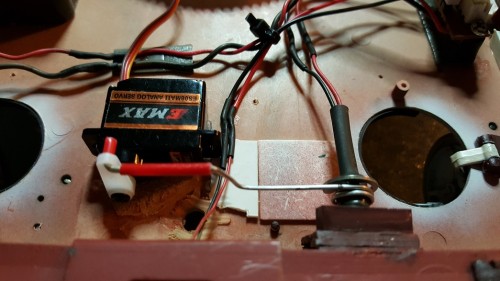 My solution to the servo arm throw. ( I ended up using a drop of hotglue to keep the sleeve from sliding on the metal arm...strong servo! )
