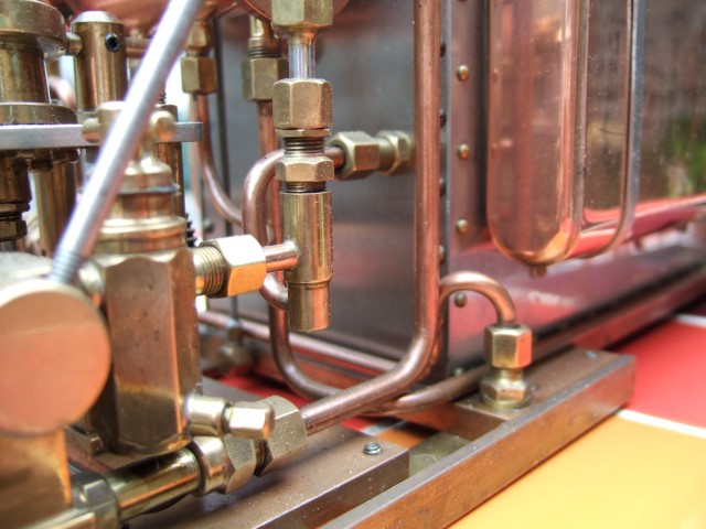 Steam inlet valve with oiler