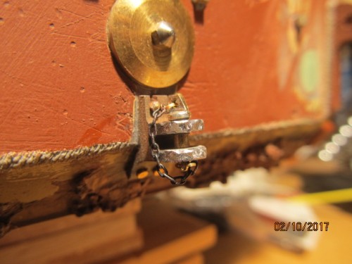 Attached retaining chain to rear hitch pin.