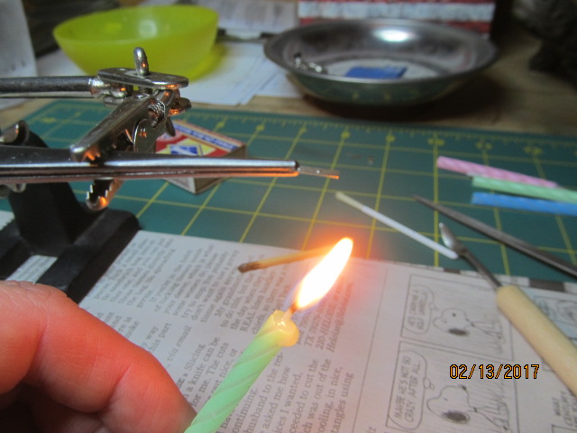 Annealing with a candle for easier bending.