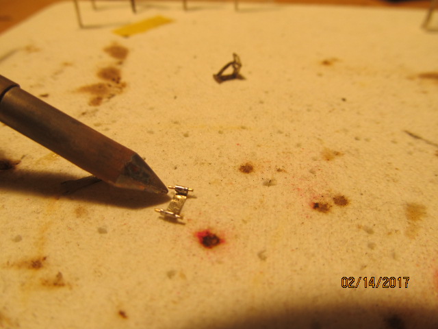 Soldering brass rod in place.
