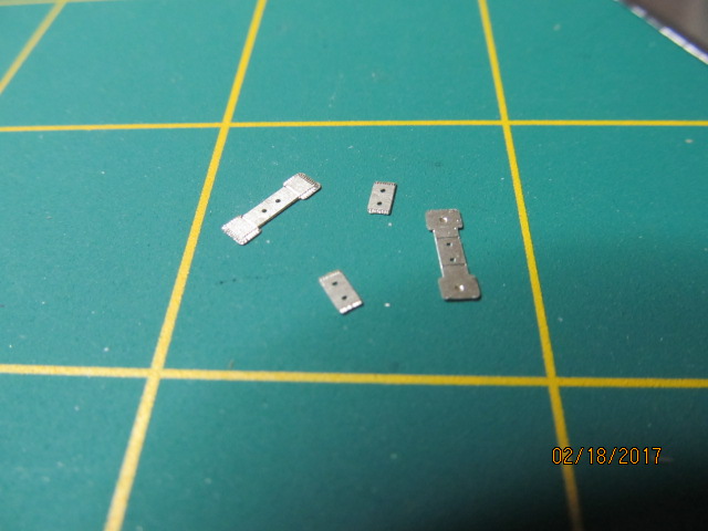 Cleaning up base plates for clamps.