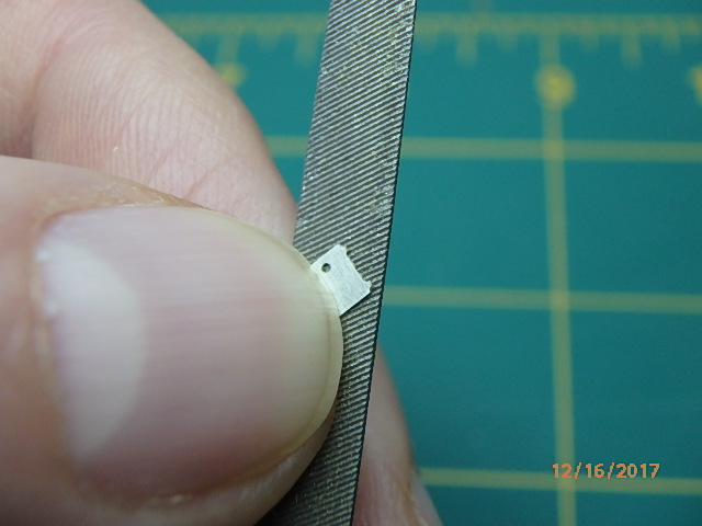 File down sprue flashing smooth.