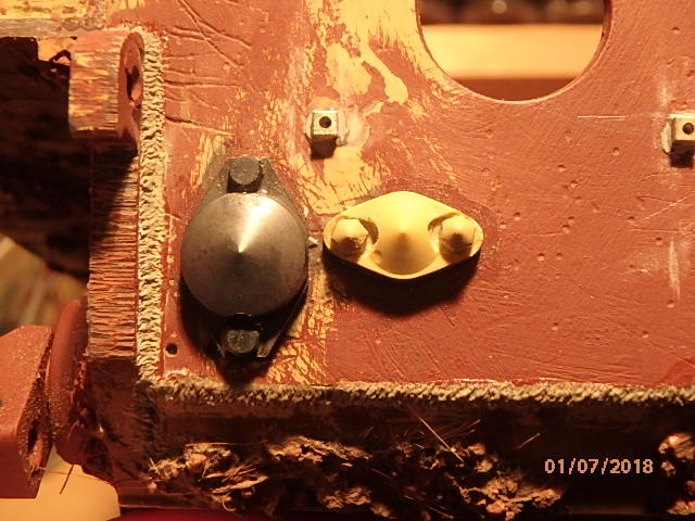 Also mounted rear engine heater port cover.
