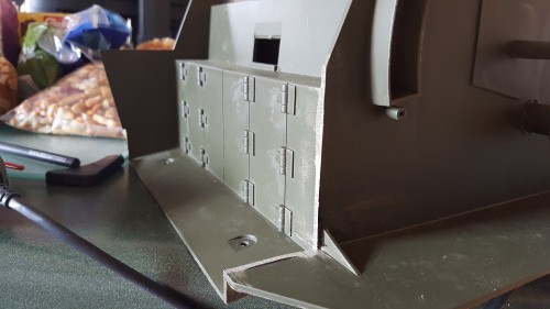 Inner sand shield fender removed.  What looks like a shadow is just a marker line.