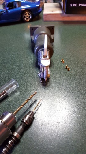 Holes drilled for brass bolts
