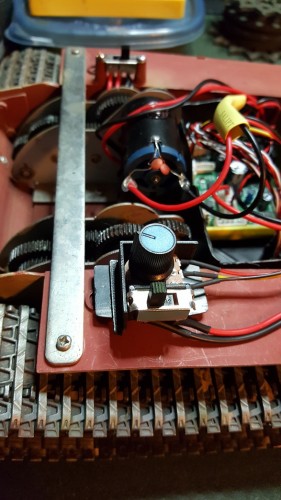 Combo mount for the sound pot and the smoker on.off switch. Put together out of scrap plastics...