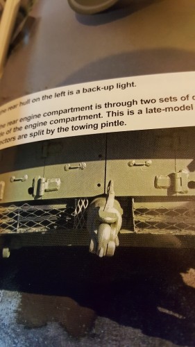 Adding in that engine door latch detail requires a pic or two for an example