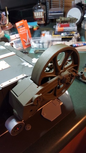 Checking how much of the inner idler arm is visible past the spring box.