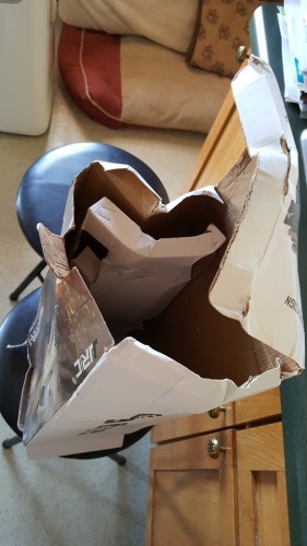 Box completely crushed and only the truck itself was holding it in shape.