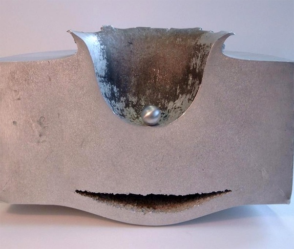 Armour cross section showing beginnings of spalling