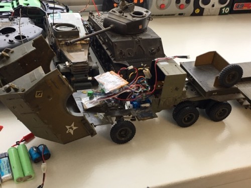 Fully proportional steering, throttle with governor ESC mod that also does a scale deceleration from top speed. Circuit board shown on top of the 2.4ghz radio EQ.