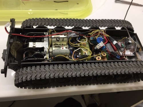 The only thing all that electronic stuff does is enhance low speed control of the tracks. Custom ESC using micro Toy grade 49 mhz receiver.