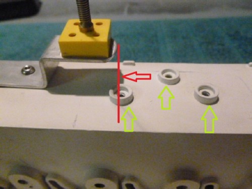 Green arrows show speaker mounting points, speaker can no longer fit forward of the red line